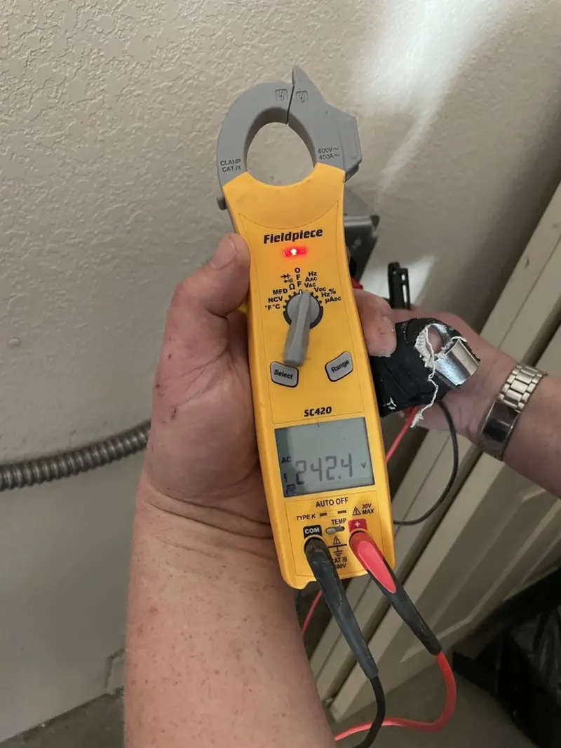 Voltage testing with clamp meter during Generator Installation in Tarpon Springs